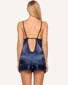 Back view: navy satin lace pajama set with open-back cami top and shorts