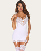 White lace full slip with plunging neckline, lace hem, and attached garter belt