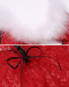 Red lace lingerie teddy detail with white fur trim and black bow ribbon.
