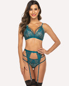 Teal lace lingerie set with lace-trim bra, high-cut thong, and garters