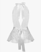 White lace halter teddy with open back tie and peplum-style ruffle at hem.
