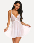 White lace babydoll nightdress with underwire cups, bow at bust, and pleated sheer skirt