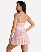 Plus size lace babydoll in light pink floral print from the back, sheer skirt with lace trim