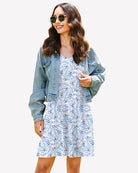 Racerback sleep dress with blue and white leaf print, sleeveless shift length