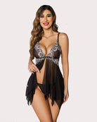 Black lace front night dress with floral trim, sheer mesh skirt, and tie-back detail