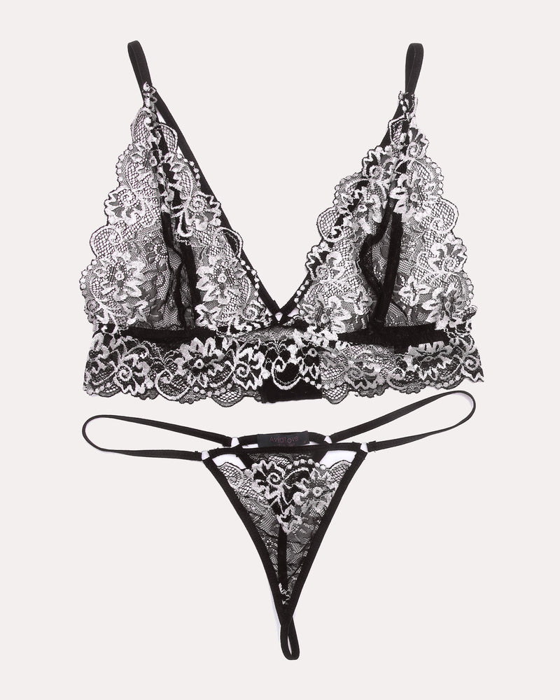 Lace V-neck bra and thong panty set, black with white floral lace trim, front view