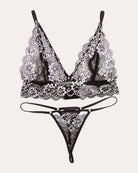 Lace V-neck bra and thong panty set, black with white floral lace trim, front view