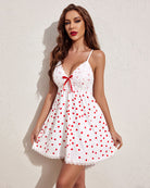 White heart print V-neck babydoll with red bow and lace bust, lace hem