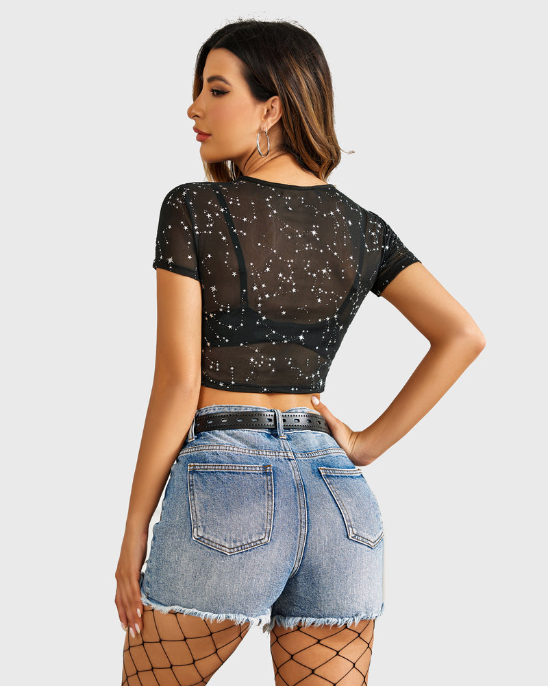Mesh crop top, black sheer with star print, short sleeves, back view