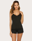 Black cami pajama set with lace neckline and lace-trim shorts