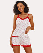White mini floral cami pajama set with red lace trim and matching shorts