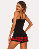 Black lace-trim cami pajama set with red plaid shorts and scalloped hem