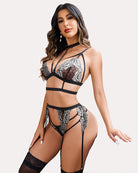 Lace bra and panty set in black with gray floral lace, garter straps and stockings