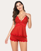 Red lace camisole and shorts pajama set with scalloped trim and bow neckline