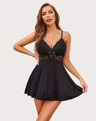 Black lace full slip dress with V-neckline and bow at center