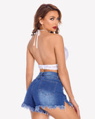White deep V lace wirefree bra back view with thin tie straps and scalloped edge.