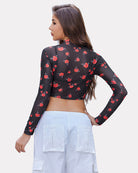 Black mesh mock neck long sleeve crop top with red floral print