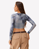 Light blue mesh long-sleeve crop top with smoky tie-dye pattern, sheer back