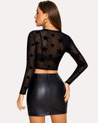 Black sheer mesh crop top with long sleeves and star cutout pattern on back