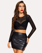 Black sheer mesh crop top with long sleeves and dotted polka dot pattern