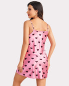 Pink satin mini slip dress with heart print and open back