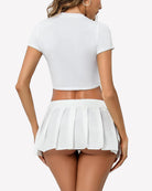 Pleated mini skirt with bow tie, back view, white
