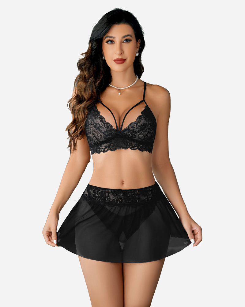 Black lace bralette with strappy neckline, sheer mini skirt and matching panty set