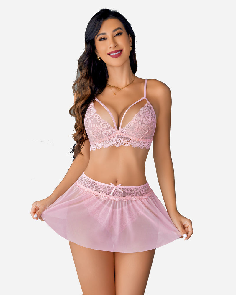 Pink lace bralette set with sheer mini skirt and matching panty, strappy cups