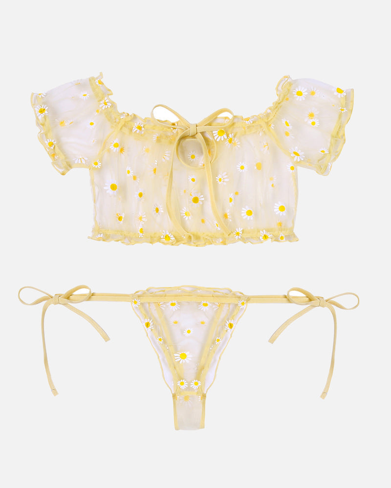 Lace ruffle bra and panty set flat lay with yellow daisy print, off-shoulder bra and thong