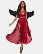 Red lace mesh dress with plunging neckline, sheer skirt, and feathered wing accents