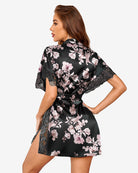 Black floral satin sleep robe, V-neck front with lace trim, short sleeves, and tied belt.