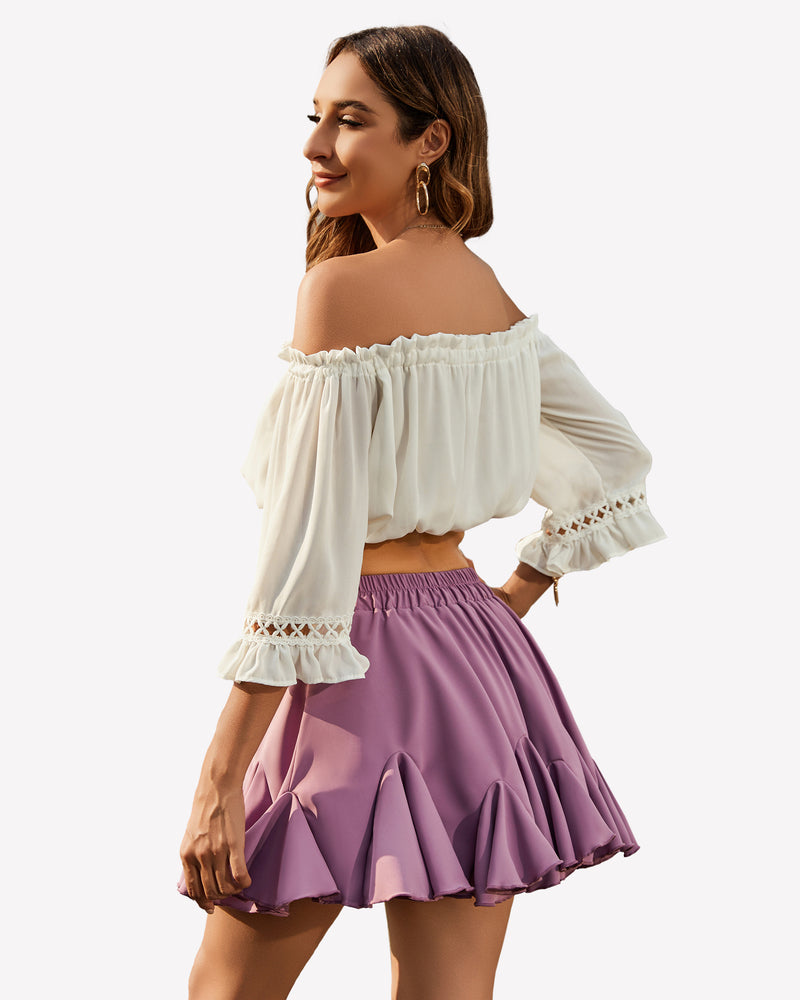 Purple pleated skater skirt with elastic waistband and layered ruffle hem