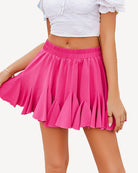 Rose pink pleated ruffle flared mini skirt with elastic waistband and gathered pleats.