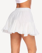White pleated skater skirt with elastic waistband and A-line ruffle tiers