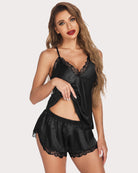 Black satin cami and shorts pajama set with lace V-neck and scalloped hem trim