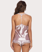Light pink satin cami and shorts pajama set with lace racer-back strap and back tie detail