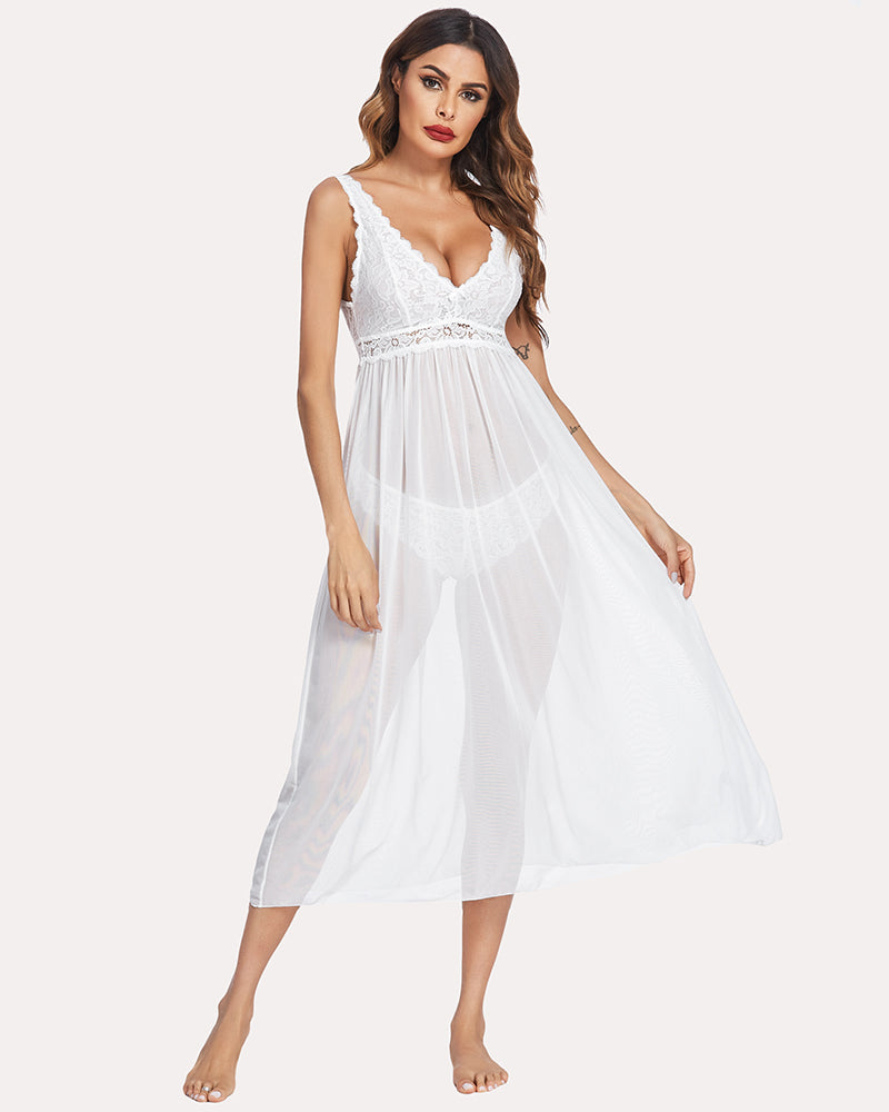 White lace V-neck chemise with gathered waist and flowing mid-calf skirt.