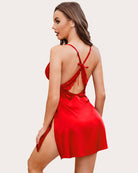 Red satin nightgown with lace back, spaghetti straps, and side slit