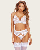 White lace bra and panty set with garter belt straps and matching garters