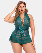 Green lace halter bodysuit with scalloped plunge neckline and waist bow, plus size