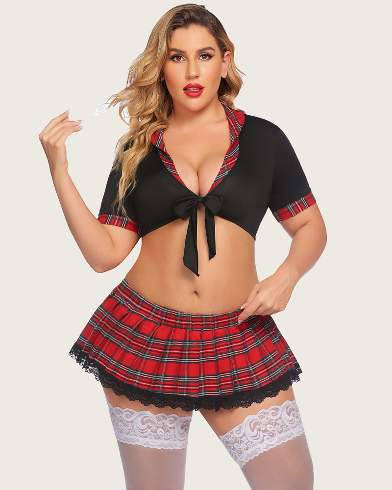 Plus size lingerie set with black tie-front top and red plaid mini skirt with lace trim