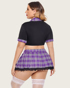 Plus-size lingerie set with black tie-top and purple plaid mini skirt, lace hem