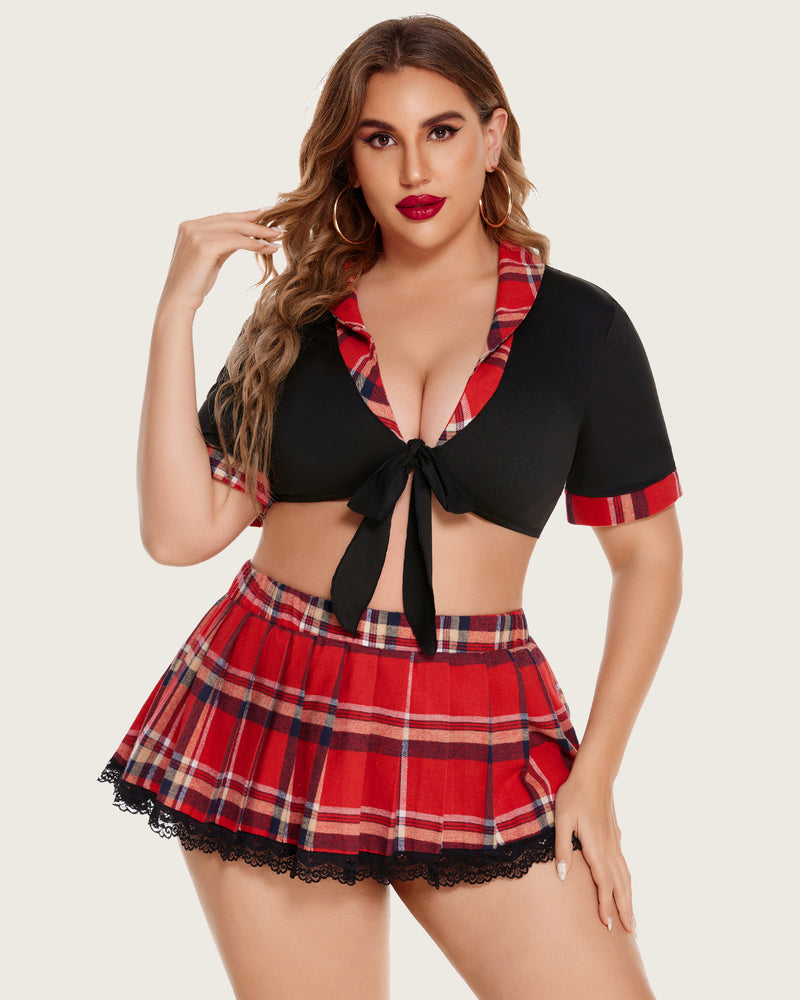 Plus size lingerie set with black tie-front top, red plaid mini skirt and lace trim