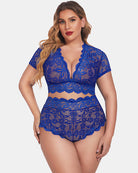 Navy blue lace lingerie set, front view with scalloped V-neck bralette and matching high-waist shorts
