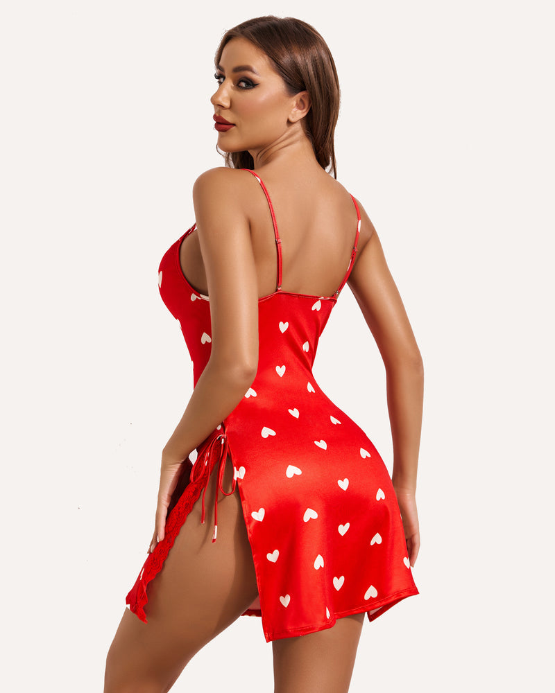 Back view of red heart-print lace chemise with adjustable spaghetti straps and tie detail