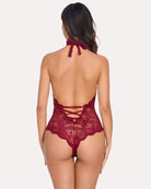 Back view: burgundy lace bodysuit with open back and crisscross straps