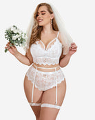 White lace bra and thong set with garter straps and scalloped trim