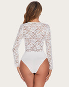 White lace long-sleeve bodysuit, back view with V-shaped leg cut