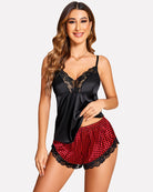 Black satin lace-trim camisole and red plaid shorts pajama set