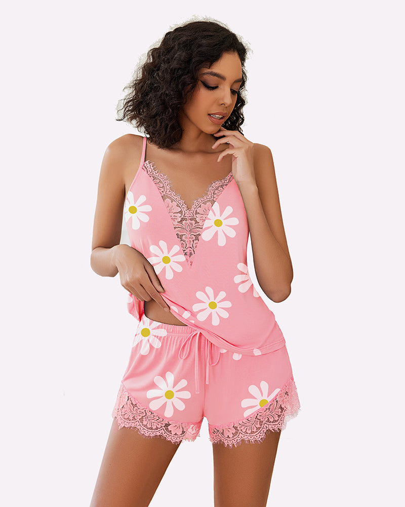 Pink floral pajama set with lace-trim camisole and matching lace-edged drawstring shorts
